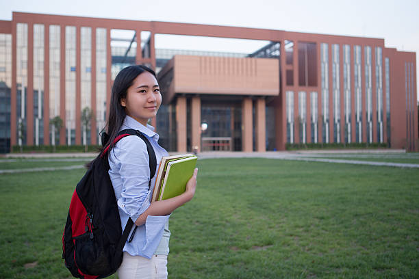 istock Asian female students on campus 495589553