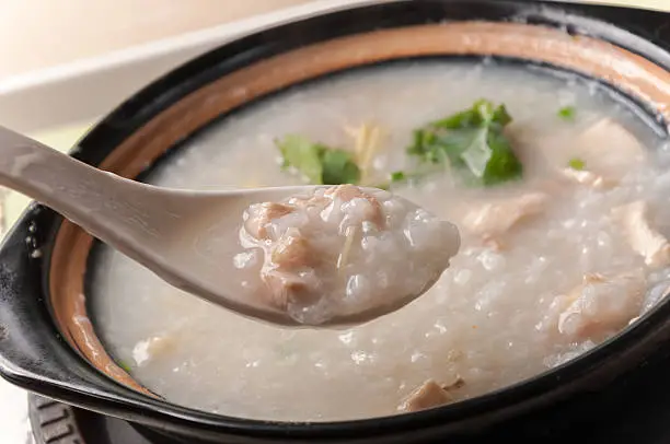 Porridge, abalone & chicken Porridge (congee) served in claypot