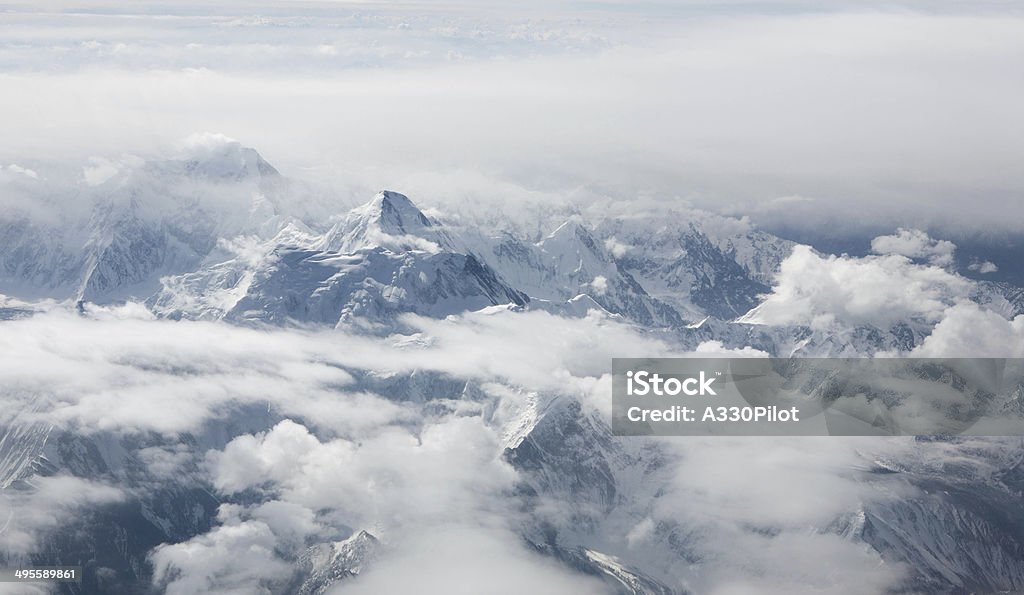Mountain Peaks Some of the highest peaks in the Himalayas. Cloud - Sky Stock Photo