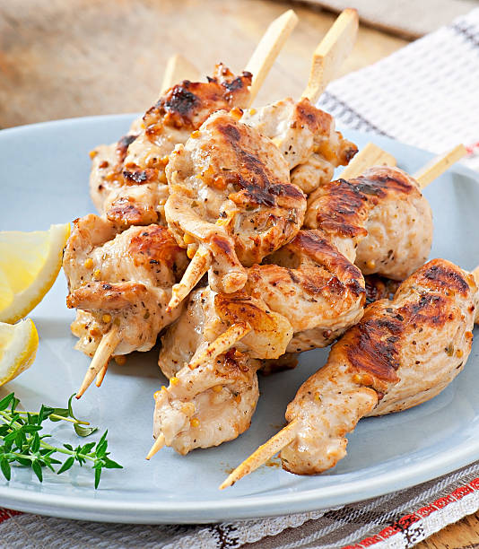 istock grilled chicken on bamboo skewers 495590471