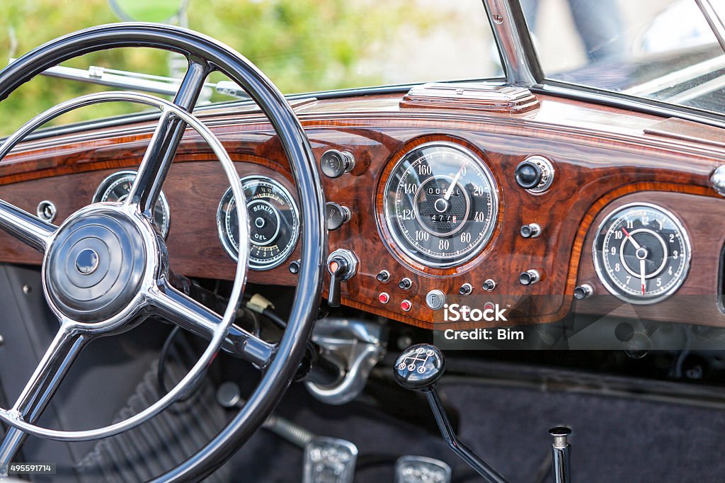 Interior of Old Car dashboard and steering wheel of a vintage convertible car Vintage Car Stock Photo