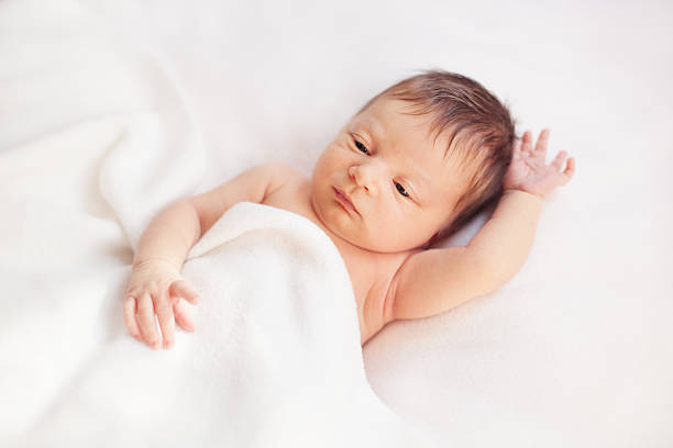 istock healthy newborn baby sleeping 495594284