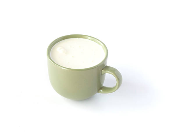 istock Cup of milk isolated on white 495599480