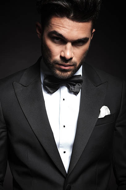 istock handsome elegant business man lifting one eyebrow. 495602284
