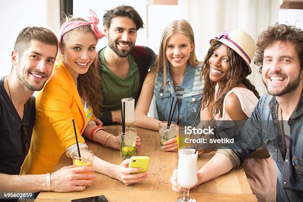 Friends Having Fun At The Bar Stock Photo - Download Image Now - 20-29 Years, Adult, Adults Only