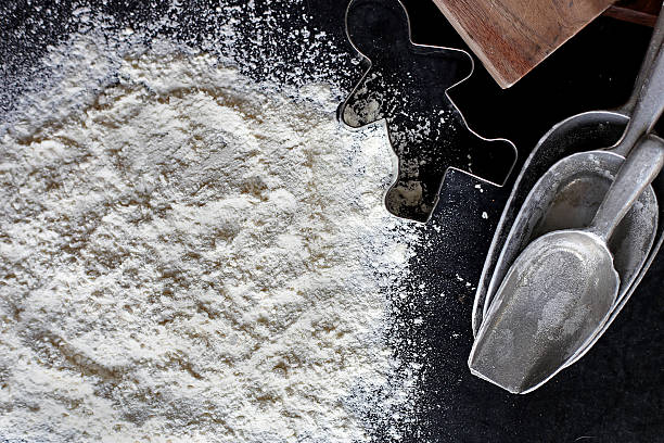 istock White Baking Flour Background with Kitchen Supplies Border 495602884