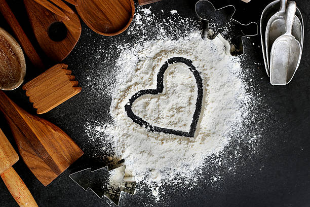 istock Heart Drawn in Baking Flour with Kitchen Supplies Border 495603024