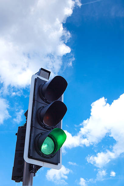 istock Green Traffic Light in the sky, freedom concept 495604929