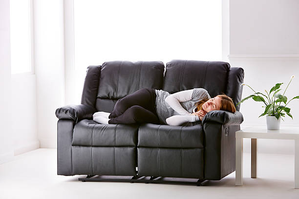istock Woman on sofa - Stock Image 495605061