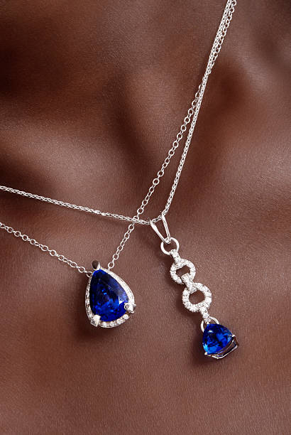 Blue Stones Necklaces Two Pendants with Sapphire/Tanzanite around her neck sapphire stock pictures, royalty-free photos & images