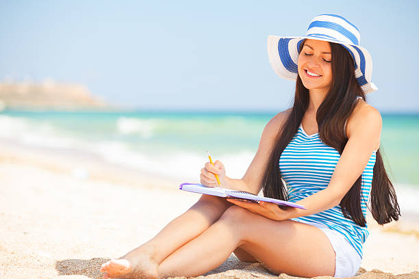 istock Young brunette girl with note and pencil 495605345