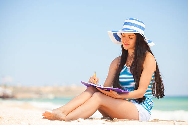 istock Young brunette girl with note and pencil 495605353
