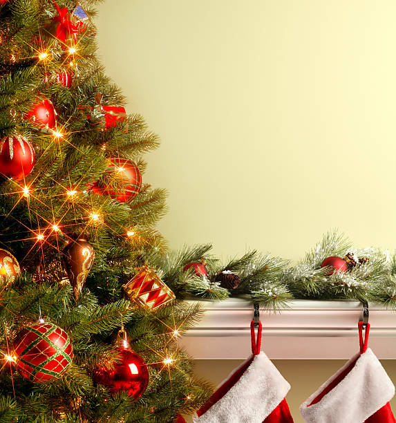 istock Christmas Tree With  Stockings Hung On Mantelpiece 495605778