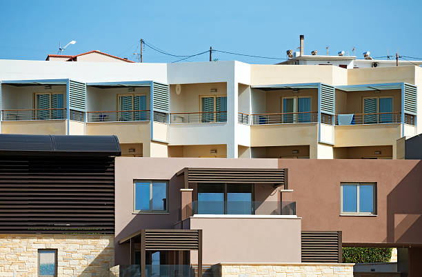 istock Two tropical apartment buildings with balconies. 495612036