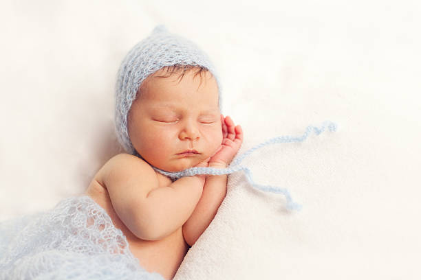 istock healthy newborn baby sleeping 495612564