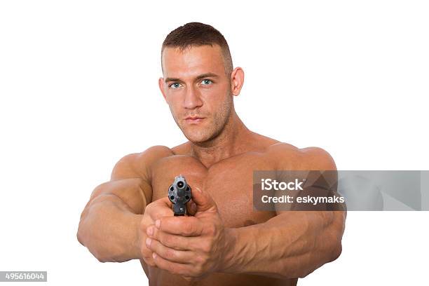 Man With A Gun Isolated On A White Background Stock Photo - Download Image Now - 2015, Adult, Adults Only