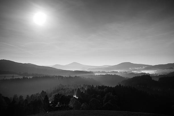 istock Ful moon night. Fog is moving between hills and peaks 495616156