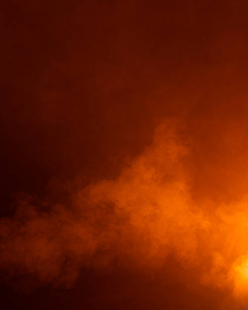 istock Bright Orange Fog on Dark Background 495616986