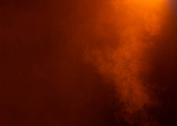 istock Bright Orange Fog on Dark Background 495617788