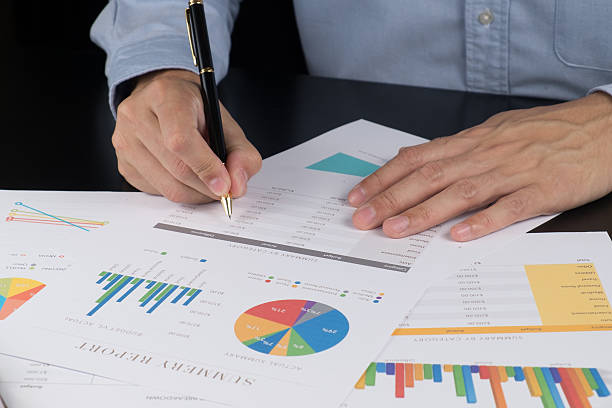 istock Man Analysis Business and financial report. 495621326