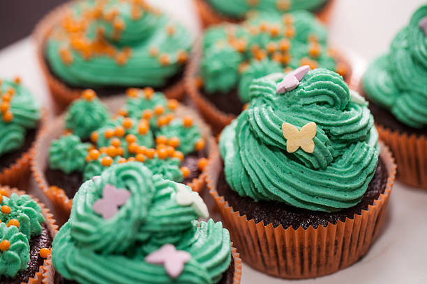 istock muffins with green cream 495621482
