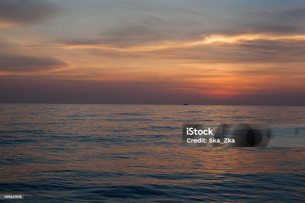 Scenic view of beautiful bright sunset above the sea Scenic view of beautiful bright sunset  2015 Stock Photo