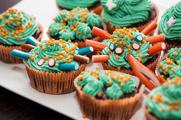 muffins with green cream and gels