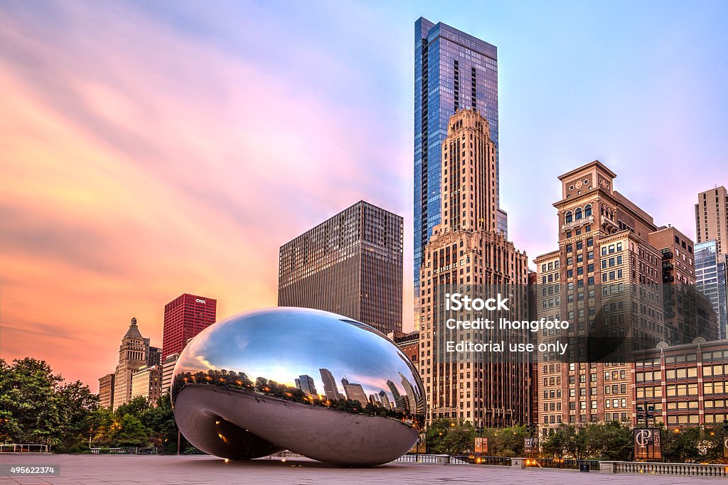 Sunrise at Cloud Gate Chicago, USA - July 2015: The sculpture \"Cloud Gate\" also nicknamed \"The Bean,\" located in Millennium Park, Chicago, Illinois. Sculpture was created by Anish Kapoor. Chicago - Illinois Stock Photo