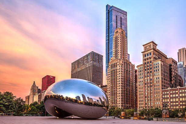 Sunrise at Cloud Gate Chicago, USA - July 2015: The sculpture \"Cloud Gate\" also nicknamed \"The Bean,\" located in Millennium Park, Chicago, Illinois. Sculpture was created by Anish Kapoor. illinois photos stock pictures, royalty-free photos & images