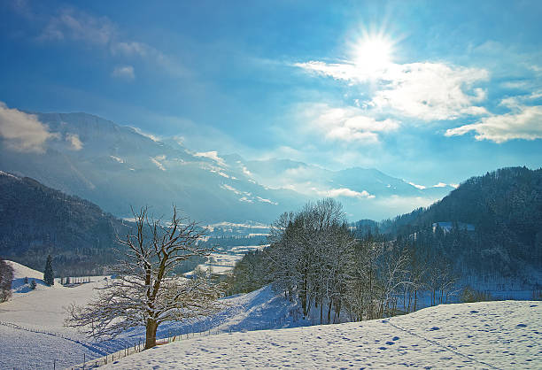 Panoramic view of beautiful winter landscape Panoramic view of beautiful winter landscape in the region of Gruyere, province of Fribourg, Switzerland fribourg city switzerland stock pictures, royalty-free photos & images