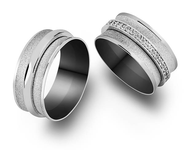 wedding rings on white background stock photo