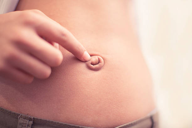 Belly Button Stock Photos, Pictures & Royalty-Free Images - iStock