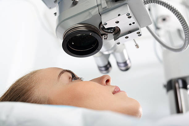 Operation of sight. Eye doctor during the treatment of vision refractive surgery  myopia stock pictures, royalty-free photos & images