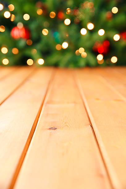 istock Wood Floor In Front Of Christmas Tree 495625140