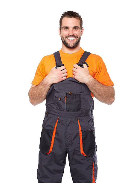 istock Portrait of smiling worker in blue uniform 495625223