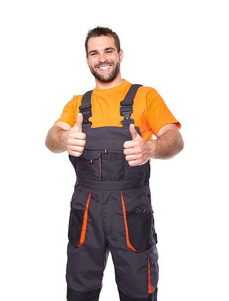 istock Portrait of smiling worker in blue uniform 495625227