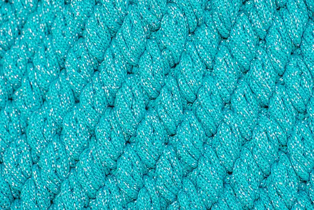 This is the picture of blue diagonal pattern of knittingwool. 