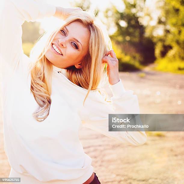 Cute Smiling Girl Outdoor In The Park Looking At You Stock Photo - Download Image Now