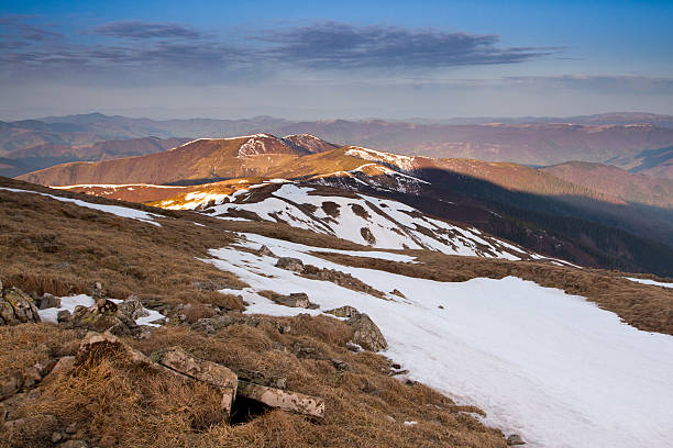 istock Last year snow in mountains 495625845