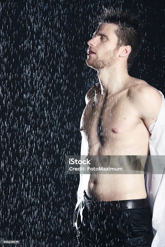 Portrait of a young businessman Portrait of a young businessman in the rain 30-39 Years Stock Photo