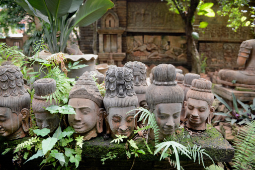 Traditional figures are available for sale in the garden of Ban Phor Linag Meun's Terracota Art at Terracota Garden in Chiang Mai in northern Thailand in South East Asia.