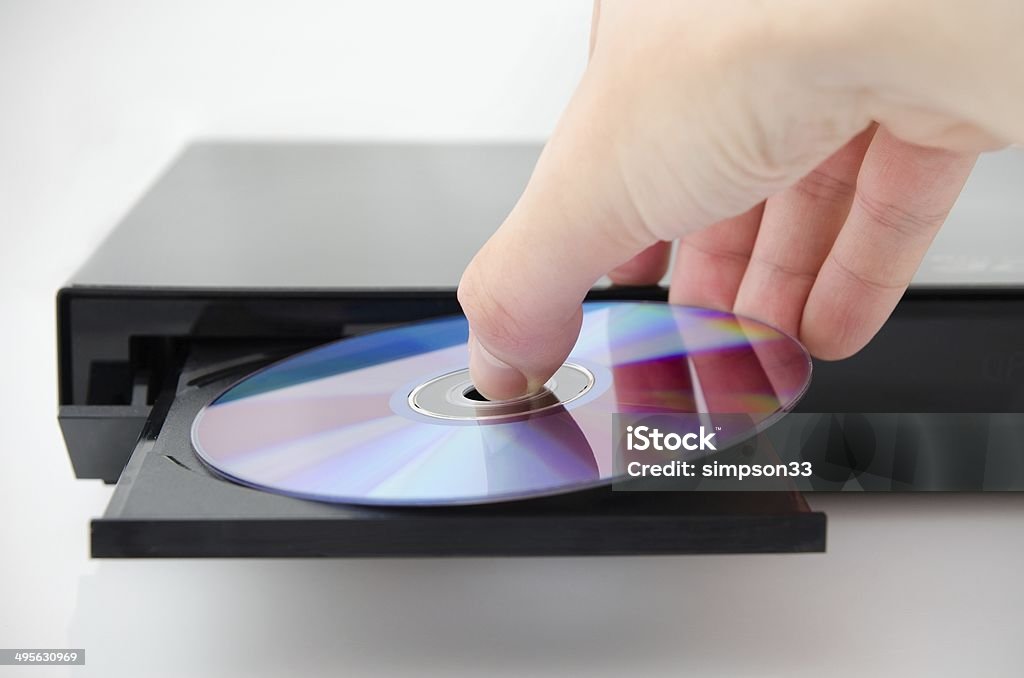 Disc insterted to DVD or CD player DVD Stock Photo