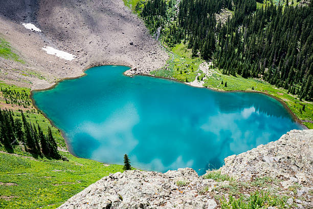 The first of 3 glacial lakes found on the Blue Lakes trail just outside of Ridgway Colorado. This first lake is a crystal glacial lake of the most beautiful blue that can only truly be appreciated by climbing the trail above it to get a full view. Surrounded by mountain views, meadows, flowing creeks. The area is known for the wildflowers and mushrooms found all over in a rare display. 