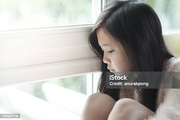 Portrait Of Asian Beautiful Sad Girl Stock Photo - Download Image Now - Sadness, Child, Girls