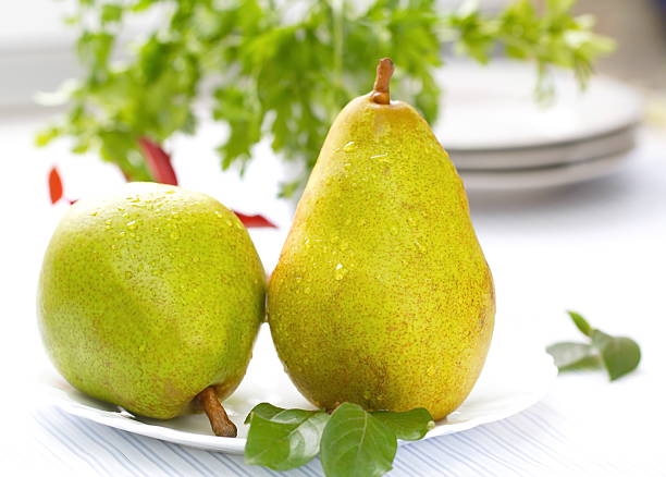 istock Fresh pears with drops of water 495640144