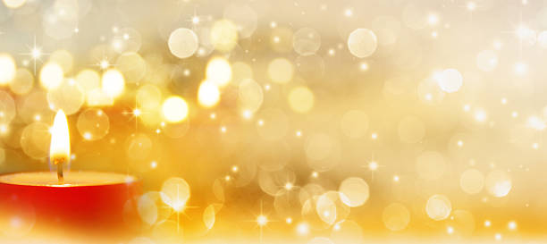 Candles Festive background in gold with a candle funkeln stock pictures, royalty-free photos & images