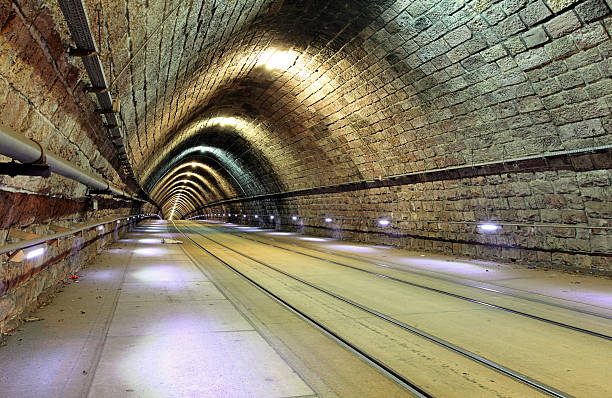 istock Tunnel with railroad and tram 495649618