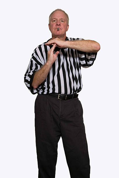 Technical Foul Man dressed as a basketball referee giving sign for technical foul. foul stock pictures, royalty-free photos & images