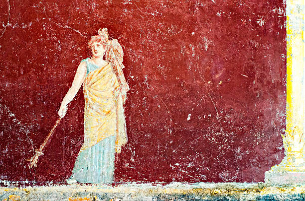 Roman Fresco of God Mercury detail of the fresco in Pompeii with winged griffin on a red background Pompeian fresco stock pictures, royalty-free photos & images