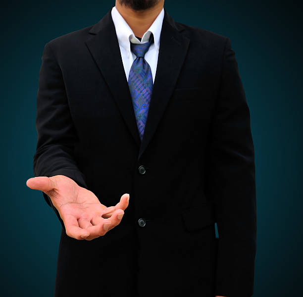 istock businessman giving a hand 495653253